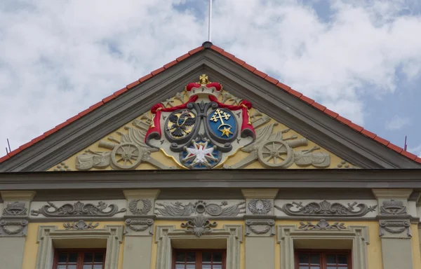 Nesvizh, Belarus - August, 03, 2016: The coat of arms of the Radziwill family on the Pediment of the Central part of Nesvizh castle