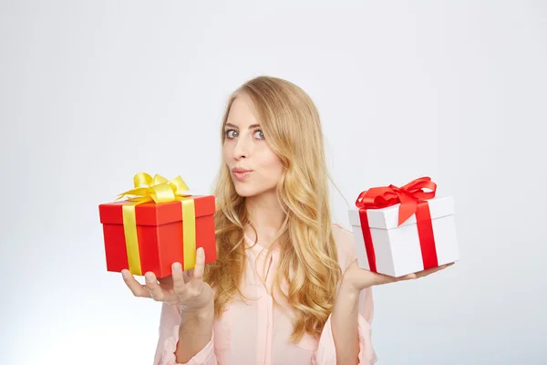 Young blond woman with present box.