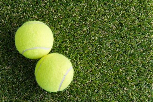 Tennis ball on the lawn