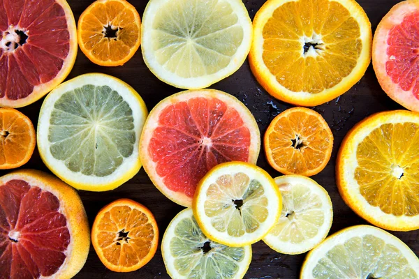 Citrus fruits slices. Oranges, grapefruits and lemons