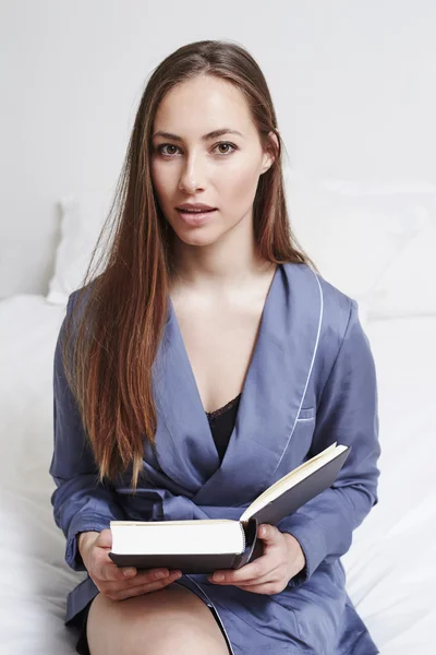Beautiful woman with book