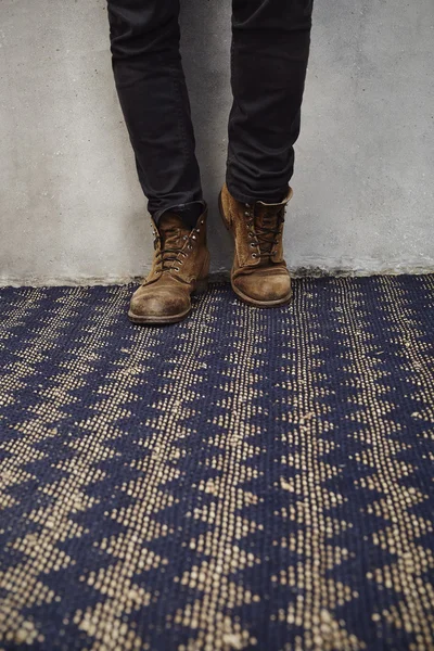 Old boots and jeans
