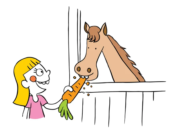 Little girl feeding horse carrot