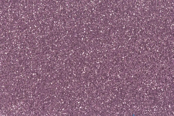Purple glitter texture abstract background.  Low contrast photo.