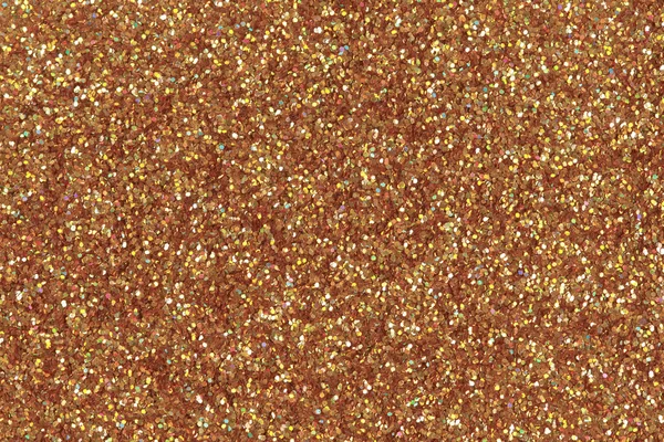 Abstract orange glitter background.  Low contrast photo.