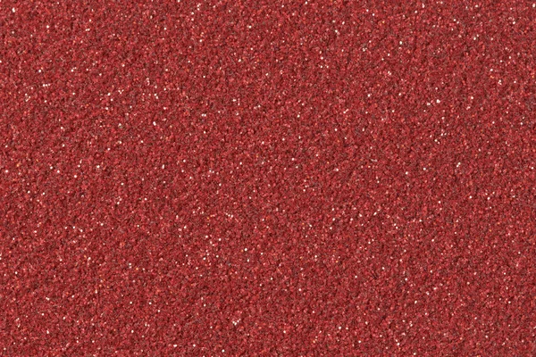 Abstract red Christmas glitter background.  Low contrast photo.