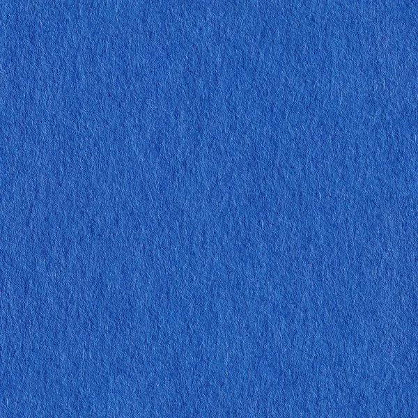 Close up aka macro shot of blue construction paper. Seamless squ
