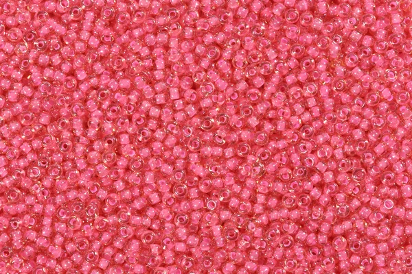 Pink glass beads. Close up shot.