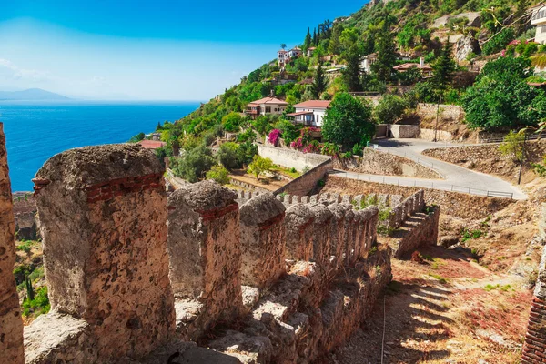 Beautiful sea landscape of Alanya Castle in Antalya district, Turkey, Asia. Famous tourist destination with high mountains. Summer bright day and sea shore