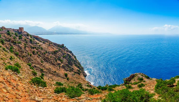 Beautiful sea panorama landscape of Alanya Castle in Antalya district, Turkey, Asia. Famous tourist destination with high mountains. Summer bright day and sea shore