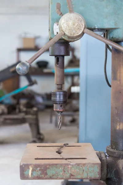 Drill press in a mechanical workshop.