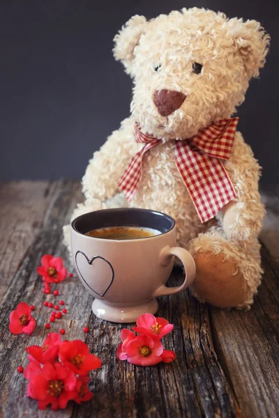 Teddy bear, flowers and coffee