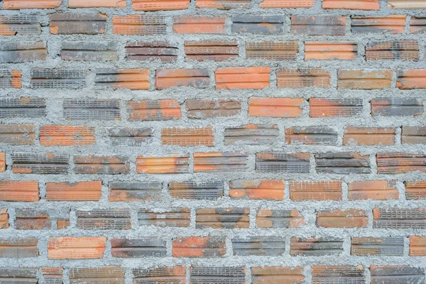 Black and orange brick wall