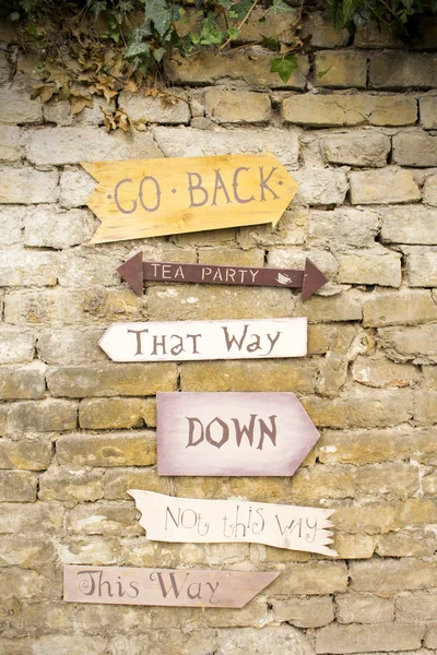Wooden signs hanging on the Wall