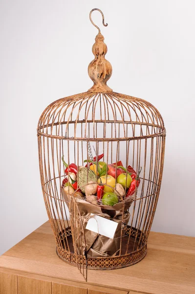 The original unusual edible vegetable and fruit bouquet  with card in bird cage