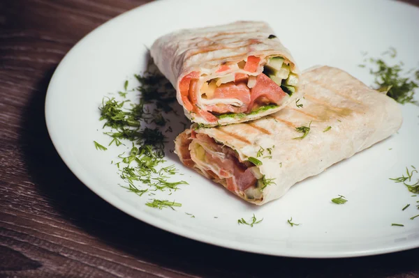 Smoked salmon wrap with vegetables