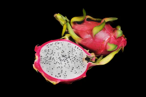 Sliced pitahaya or dragon fruit on black background.