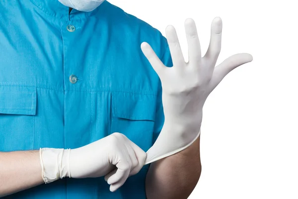 Unknown male surgeon doctor clothing white glove on the hand