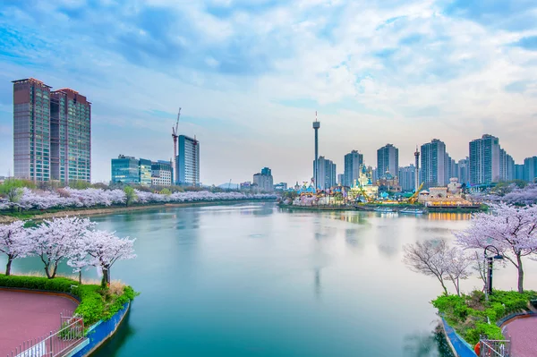 Korea cityscape with Lotte world and Cherry Blossom Festival in Spring,Seoul in South Korea.