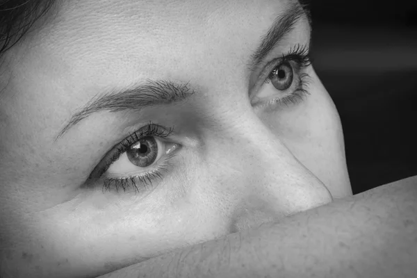 Portrait pensive middle aged woman closeup. Black and white