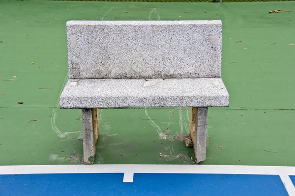 Lonely stone chair in stadium