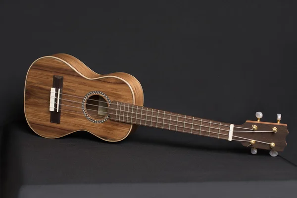 Wooden Ukulele 	musical instrument