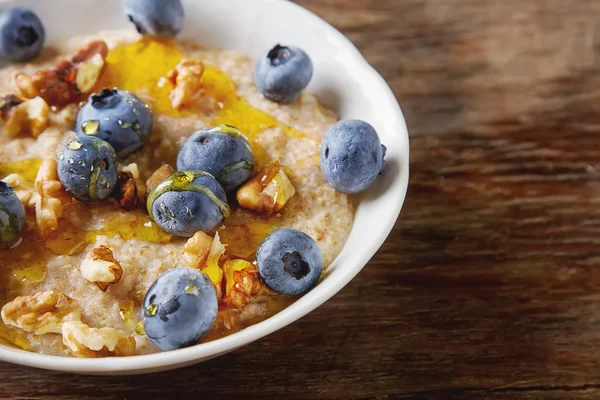 Perfect breakfast. Oatmeal blueberry walnut and honey. Healthy e