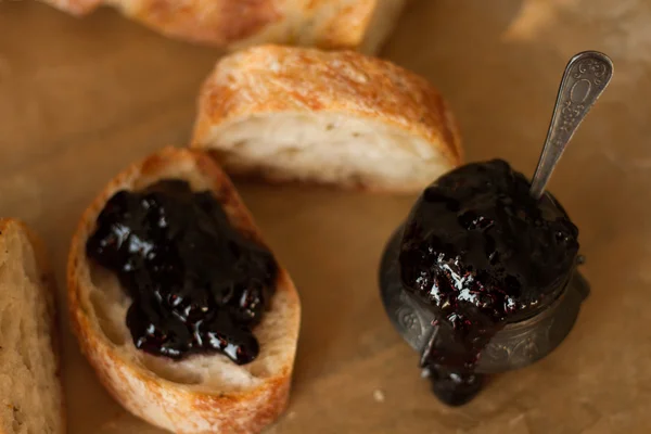 Fresh bread for sandwiches with cranberry jam