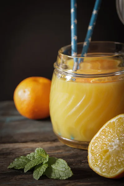 Orange juice with mint leaves
