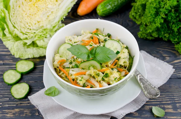 Cabbage salad with cucumber and carrots