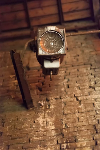 The old searchlight, behind the scenes of a theatrical stage.