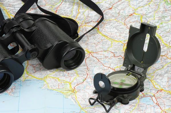 Binoculars, compass and map