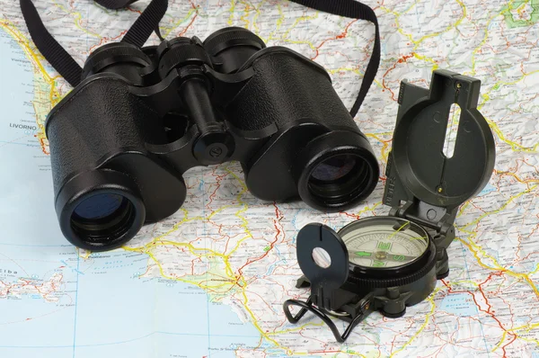 Binoculars, compass and map