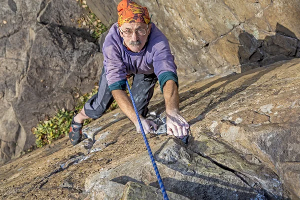 Aged rock climber