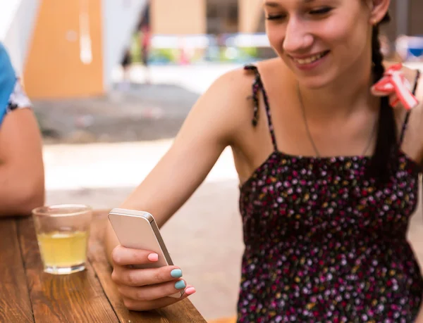 Young woman with telephone