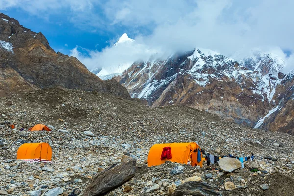 Orange Mountain Tents on Giant Glacier Moraine