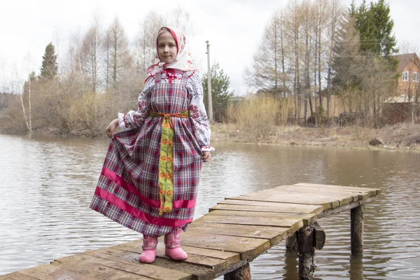 Beautiful young Russian girl in national dress