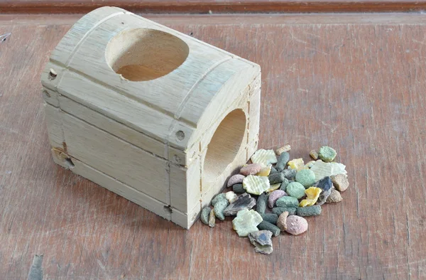 Hamster food and wooden block for playing