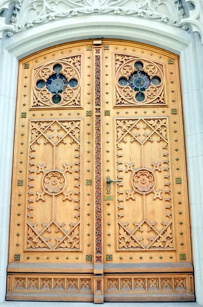 Arch wood door in Switzerland