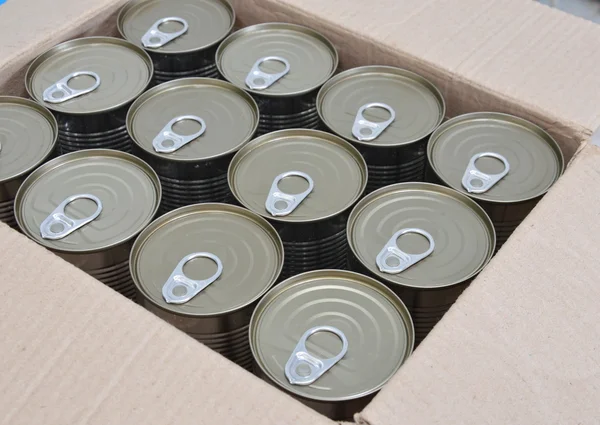 Tin food can in paper box