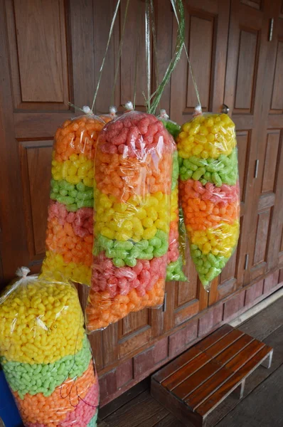 Fish food in plastic bag hanging for sale