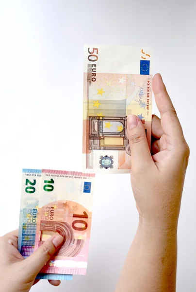 Euro bills on hand