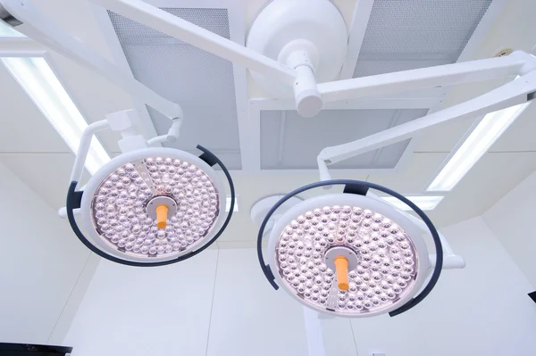 Two surgical lamps