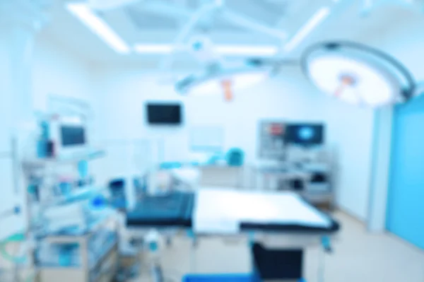 Blur of equipment and medical devices in modern operating room