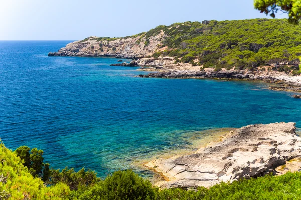 View of the rocky cliffs and clear sea