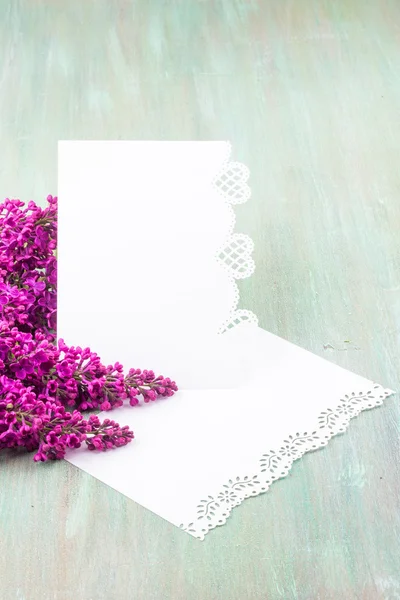 White lilac, lilac purple, white sheet of paper with hearts punc