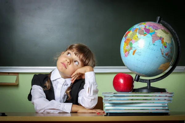 School, girl, schoolgirl 6 years in a black dress and a white sh