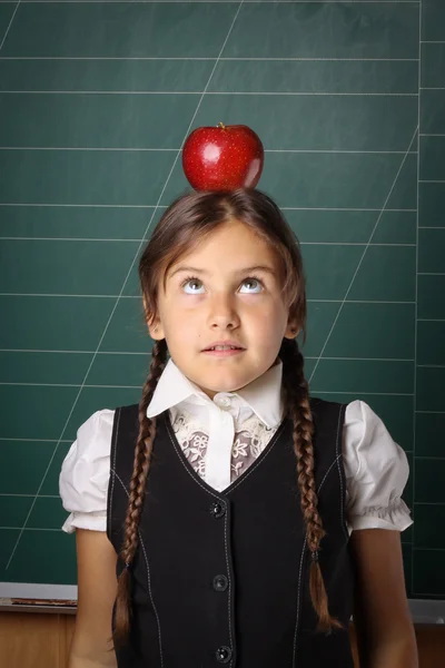 Girl schoolgirl in a black school uniform, a white shirt, with t