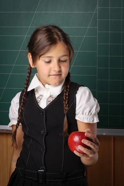 Girl schoolgirl in a black school uniform, a white shirt, with t