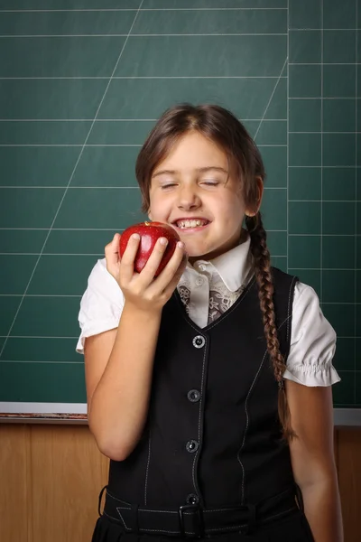 Girl schoolgirl in a black school uniform, a white shirt, with t